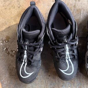 Nike alpha cleats.
